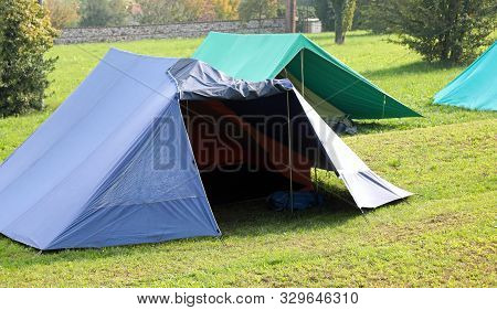 Canadian Tents On The Camp Site Of Boyscout In Early Morning Without People