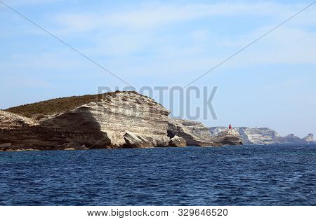 Cliffed Coast From The Mediterranean Sea Near Bonifacio Town In Corsica Island France Europe
