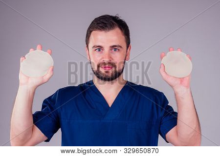 Plastic Surgeon Male Showing Before Modern Augmentation Implanty Studio White Background