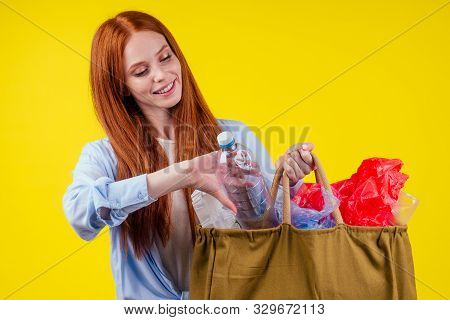 Beautiful Redhaired Ginder Happy Woman Holding Cotton Eco Bag With Sorting Recycle Trash:plastic Bot