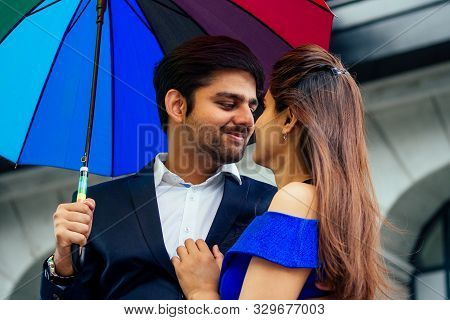 Indian Woman In Long Evening Blue Dress Spinding Romantic Time Together With Lover Handsome Boyfrien