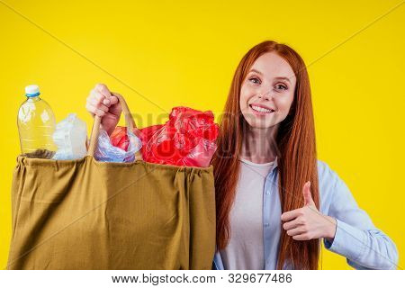 Beautiful Redhaired Ginder Happy Woman Holding Cotton Eco Bag With Sorting Recycle Trash:plastic Bot