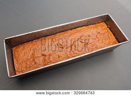 Long Thin Loaf Of Pumpkin Bread In Pan