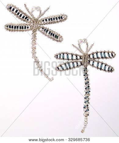 A Picture Of Two Beautiful Beaded Dragon Flies Christmas Tree Decorations