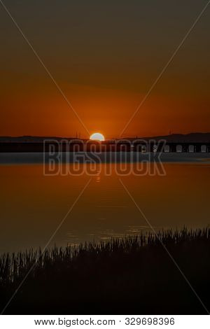 Sunrise On The Petaluma River Shinning On The Water