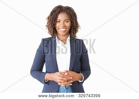 Happy Cheerful Female Consultant Looking At Camera. Young African American Business Woman With Clasp