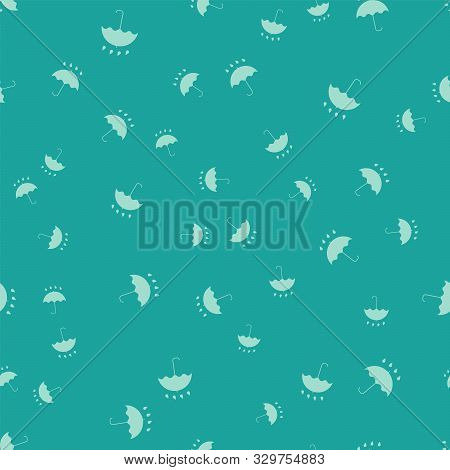 Green Umbrella And Rain Drops Icon Isolated Seamless Pattern On Green Background. Waterproof Icon. P