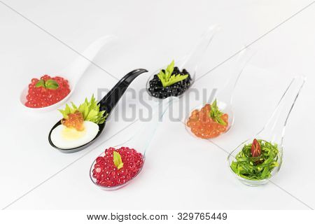Molecular Cuisine Caviar Elements Shot Closeup Of A Plastic Buffet Table Spoon.