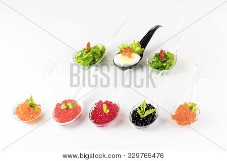 Molecular Cuisine Caviar Elements Shot Closeup Of A Plastic Buffet Table Spoon.