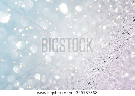 Chritmas Light Background With Snow And Blue Sky.