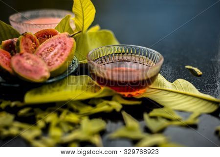 Skin Whitening Remedy/treatment On The Black Shiny Surface Consisting Of Guava Pulp And Honey. Also 