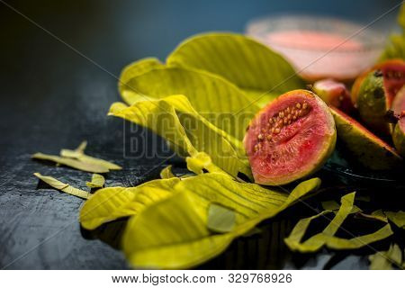 Skin Whitening Remedy/treatment On The Black Shiny Surface Consisting Of Guava Pulp And Honey. Also 