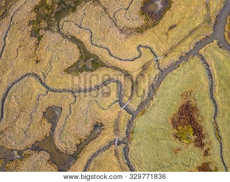 Aerial Top Down View Of Tidal Marshland With Natural Meandering Drainage System In Verdronken Land V
