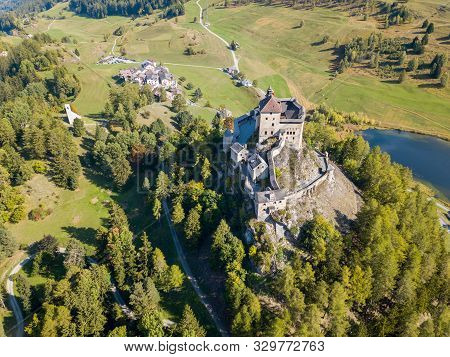 Aerial View Of Castle Tarasp (built In The 11th Century) In Swiss Alps, Canton Grisons Or Graubuendo