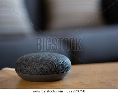 Smart Home Voice Activated Speaker Device In Living Room Lounge