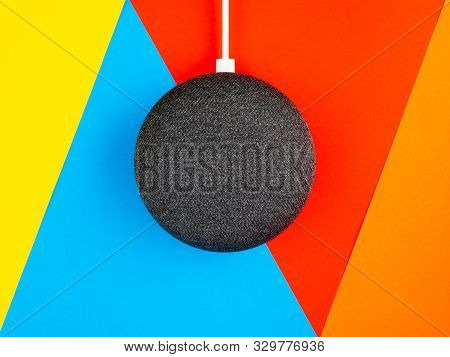 Smart Home Device Speaker On Bright Coloured Background