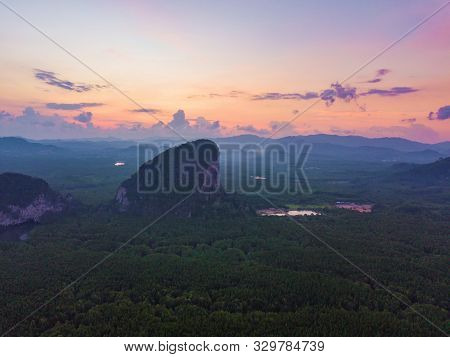 Aerial Top View Of Samet Nangshe, Mountain Valley Hills, And Tropical Green Forest Trees At Sunset W