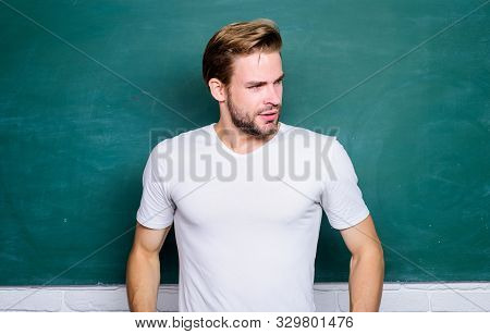 Man Teacher In Front Of Chalkboard. Teaching Could Be More Fun. Advantages For Male Elementary Teach