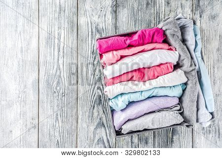 House Cleaning Concept. Vertical Tidying Up Storage. Marie Kondo Tidying Method. Neatly Folded Cloth