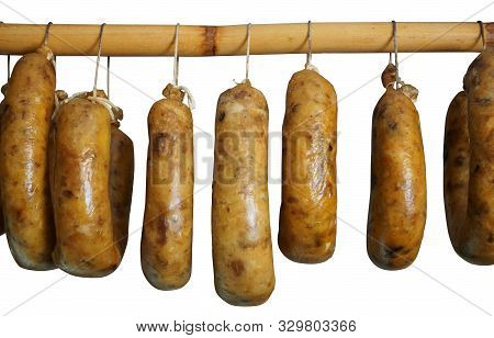 Image Of Traditional Portuguese Sausage Alheira Hanging In A Smokehouse Isolated On White Background
