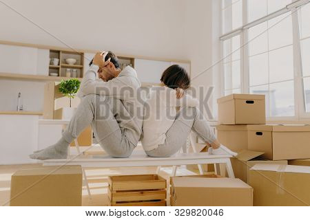 Photo Of Stressful Couple Get Divorse, Leave House, Start Living Seperately, Sit Backs To Each Other