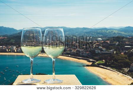 Two Drink Glass White Wine Standing On Background Blue Sea Top View City Coast Yacht From Observatio