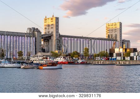 Quebec City, Canada - 4 October 2019: Quebec Harbour At Sunset, With Grain Silos In The Background.
