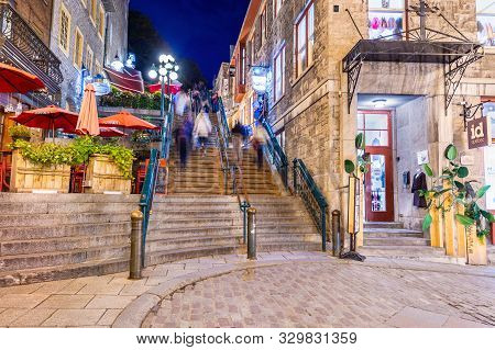 Quebec City, Canada - 4 October 2019: Tourists Visiting Petit Champlain Street In The Old Quebec Cit