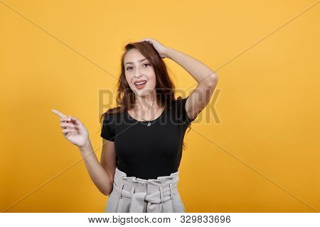 Beautiful Girl In Black Being Confused And Directing Someone As She Looks Cute Is Well. She Is Kind 