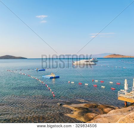 Beautiful Mediterranean Coast With Islands, Mountains And Yachts In The Blue Sea
