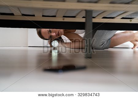 Woman Lost Smartphone And Found It Under Bed