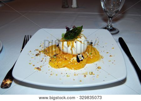 Fresh Buratta Or Mozzarella On A Plate