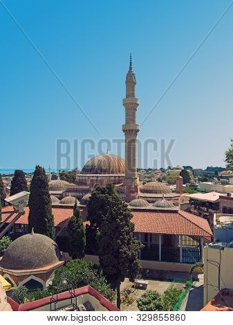 A Panoramic View Of Rhodes Town With The Dome And Minaret Of The Suleiman Mosque And City Buildings 