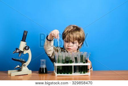 Back To School. Chemistry. Alchemy. Biology. Experiment. School Subject. Smart Boy With Test Tubes. 