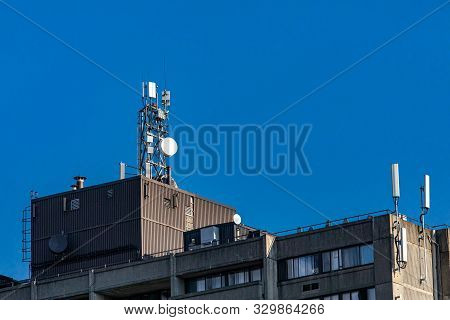View Of The Top Of An Industrial Building Equipped With Various Gps, Cellphone, 3g, 4g And 5g Teleco
