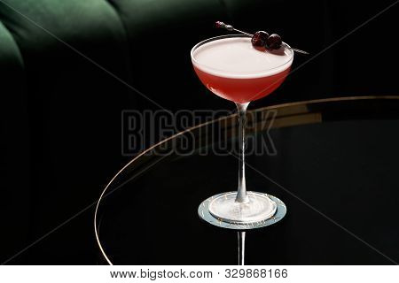 Fresh Cocktail Glass On Glass Table In Night Club Restaurant