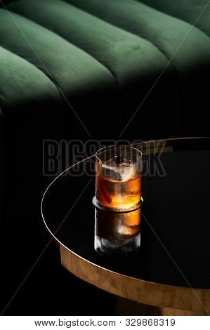 Fresh Cocktail Glass On Glass Table In Night Club Restaurant