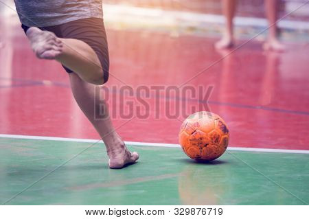 Futsal Players Barefoot. Futsal Player  Control And Shoot Ball To Goal.