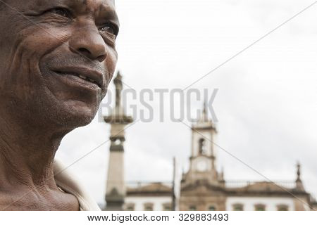 Ouro Preto, Minas Gerais, Brazil - February 27, 2016: Afro Brazilian Man At Tiradentes Square, A Rep