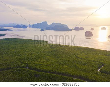 Aerial Top View Of Samet Nangshe, Mountain Valley Hills, And Tropical Green Forest Trees At Sunset W