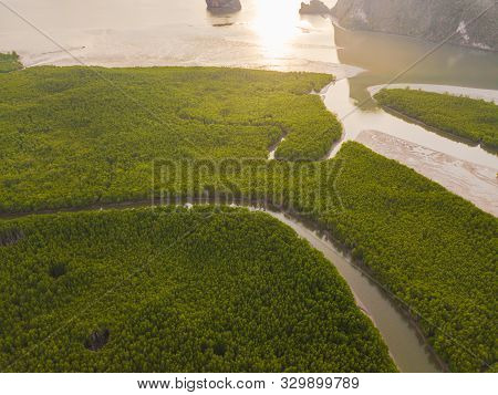 Aerial Top View Of Samet Nangshe, Mountain Valley Hills, And Tropical Green Forest Trees At Sunset W
