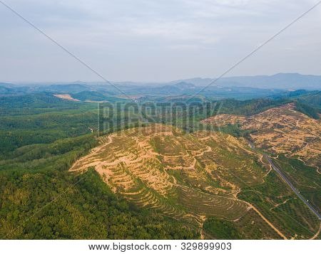 Aerial Top View Of Samet Nangshe, Mountain Valley Hills, And Tropical Green Forest Trees At Sunset W