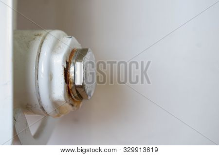 Rusty Plug Of A Central Heating Radiator.  Point Of Leakage.