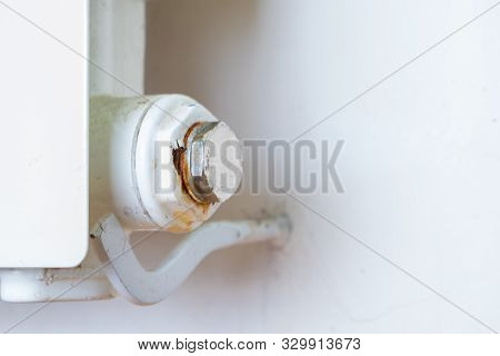 Rusty Plug Of A Central Heating Radiator.  Point Of Leakage.