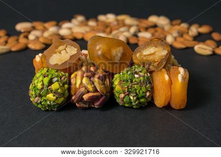 Healthy Snacks. Turkish No Sugar Food. Candy Sausage. Scattered Pistachio And Almond Nuts. Middle Ea