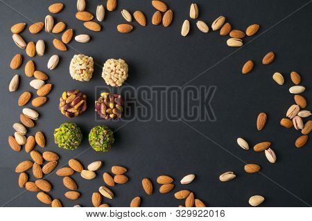 Pistachio Confectionery. Oval Scattered Pistachio And Almond Nuts. Copy Space. Top View.