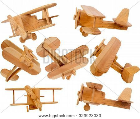Wooden Homemade Biplane Airplane In Different Projections Isolated On A White Background