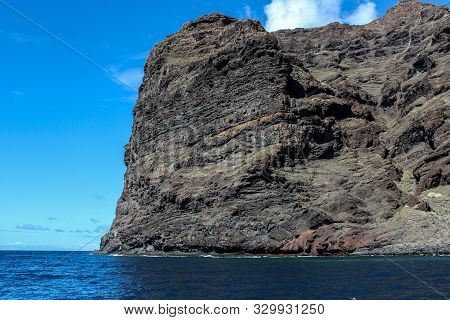 View On The Steep Coast Of Los Gigantes On Canary Island Tenerife With Rocks In Different Colors
