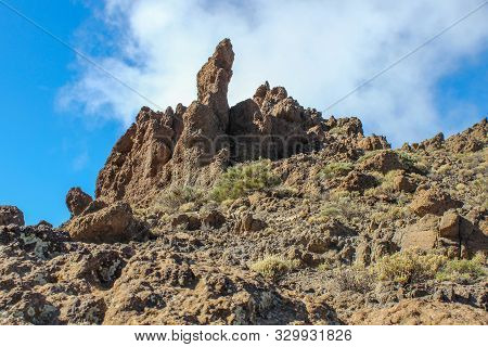 View on the steep coast of Los Gigantes on canary island tenerife with rocks in different colors