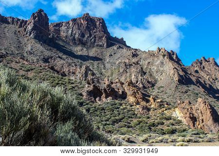 View On The Steep Coast Of Los Gigantes On Canary Island Tenerife With Rocks In Different Colors